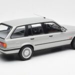 BMW 325i E30 Touring Srebrna Norev 1:18 - image 2 of 6