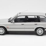 BMW 325i E30 Touring Srebrna Norev 1:18 - image 3 of 6
