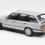 BMW 325i E30 Touring Srebrna Norev 1:18 - image 5 of 6