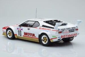 BMW M1 Motul #10 B. Darniche / A. Mahe Rally Tour de Corse 1982 IXO 1:18 18RMC114 Kovina – slika 5 od 6