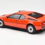 BMW M1 Oranžna Metalik Norev 1:18 - image 7 of 8