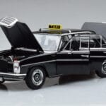 Mercedes 200 W115 Taxi Norev 1:18 183776 Kovina - image 2 of 7