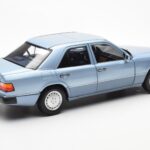 Mercedes 230E W124 Svetlo Modra Metallic Norev 1:18 - image 3 of 8