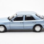 Mercedes 230E W124 Svetlo Modra Metallic Norev 1:18 - image 4 of 8