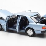 Mercedes 230E W124 Svetlo Modra Metallic Norev 1:18 - image 5 of 8