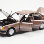 Mercedes 230E W124 Rosewood Metallic Dealerska Izdaja Norev 1:18 - image 2 of 8