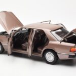 Mercedes 230E W124 Rosewood Metallic Dealerska Izdaja Norev 1:18 - image 5 of 8
