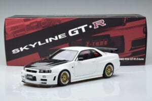 Nissan Skyline GT-R R34 Nismo Z-Tune Bel MotorHelix 1:18 M83407 Kovina – slika 11 od 11