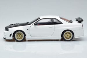 Nissan Skyline GT-R R34 Nismo Z-Tune Bel MotorHelix 1:18 M83407 Kovina – slika 5 od 11