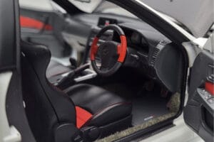 Nissan Skyline GT-R R34 Nismo Z-Tune Bel MotorHelix 1:18 M83407 Kovina – slika 8 od 11