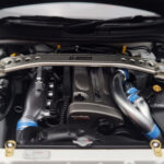 Nissan Skyline GT-R R34 Nismo Z-Tune Bel MotorHelix 1:18 - image 9 of 11