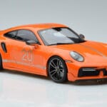 Porsche 911 992 Turbo S China 20th Anniversary Oranžna Minichamps 1:18 - image 4 of 6