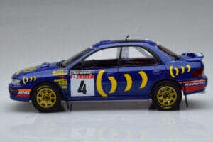 Subaru Impreza #4 C. McRae / D. Ringer Winner RAC Rally 1994 Kyosho 1:18 08962A Kovina – slika 4 od 9