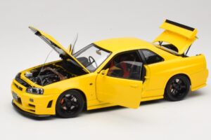 Nissan Skyline GT-R R34 Customized Version Rumena MotorHelix 1:18 M83412 Kovina – slika 2 od 8