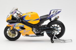 Suzuki GSX-R 1000 Team Alstare Corona Extra T. Corser WSB 2005 Minichamps 1:12 122052211 Kovina