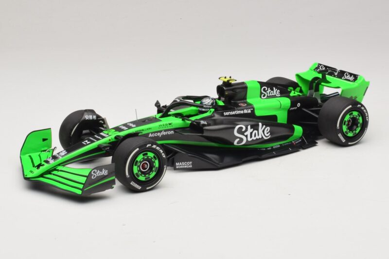 Stake Kick Sauber C44 G. Zhou Emilia Romagna GP 2024 Minichamps 1:18 117240124 Smola