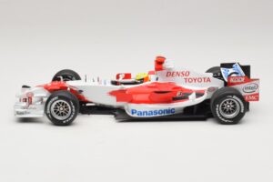 Panasonic Toyota Racing TF106 #12 R. Schumacher 2006 Minichamps 1:18 AM59557K Kovina – slika 3 od 7